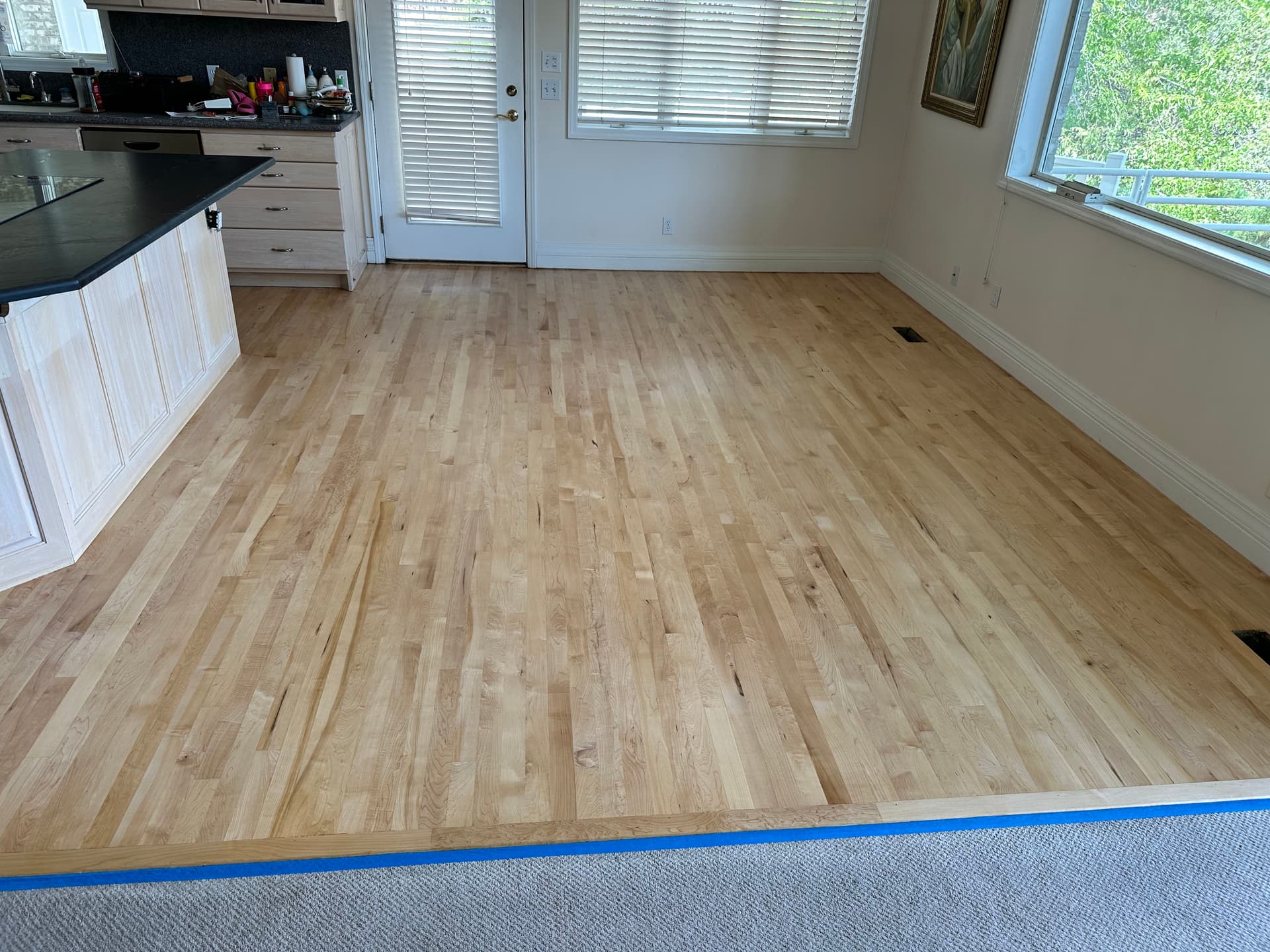 Gallery photos for Maple Hardwood Refinishing with Neutral Stain in Sandy: Image #2