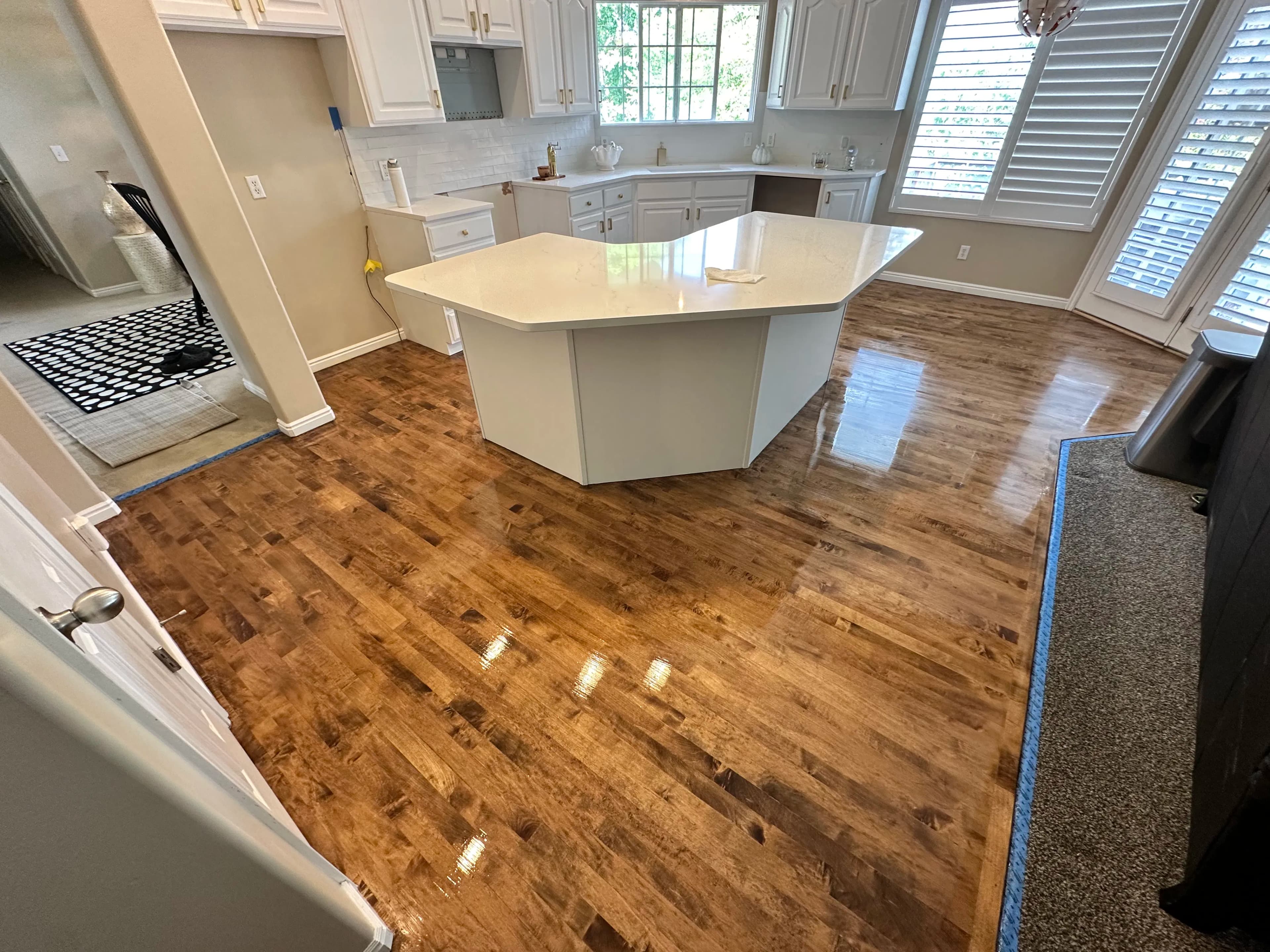 Project Maple Hardwood Floors Refinished to a Stunning Polished Finish image