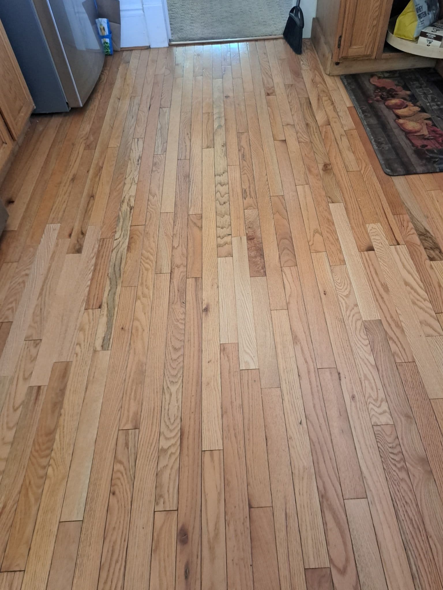 Project Burn Mark to Board Replacement on a Salt Lake City Red Oak Floor image