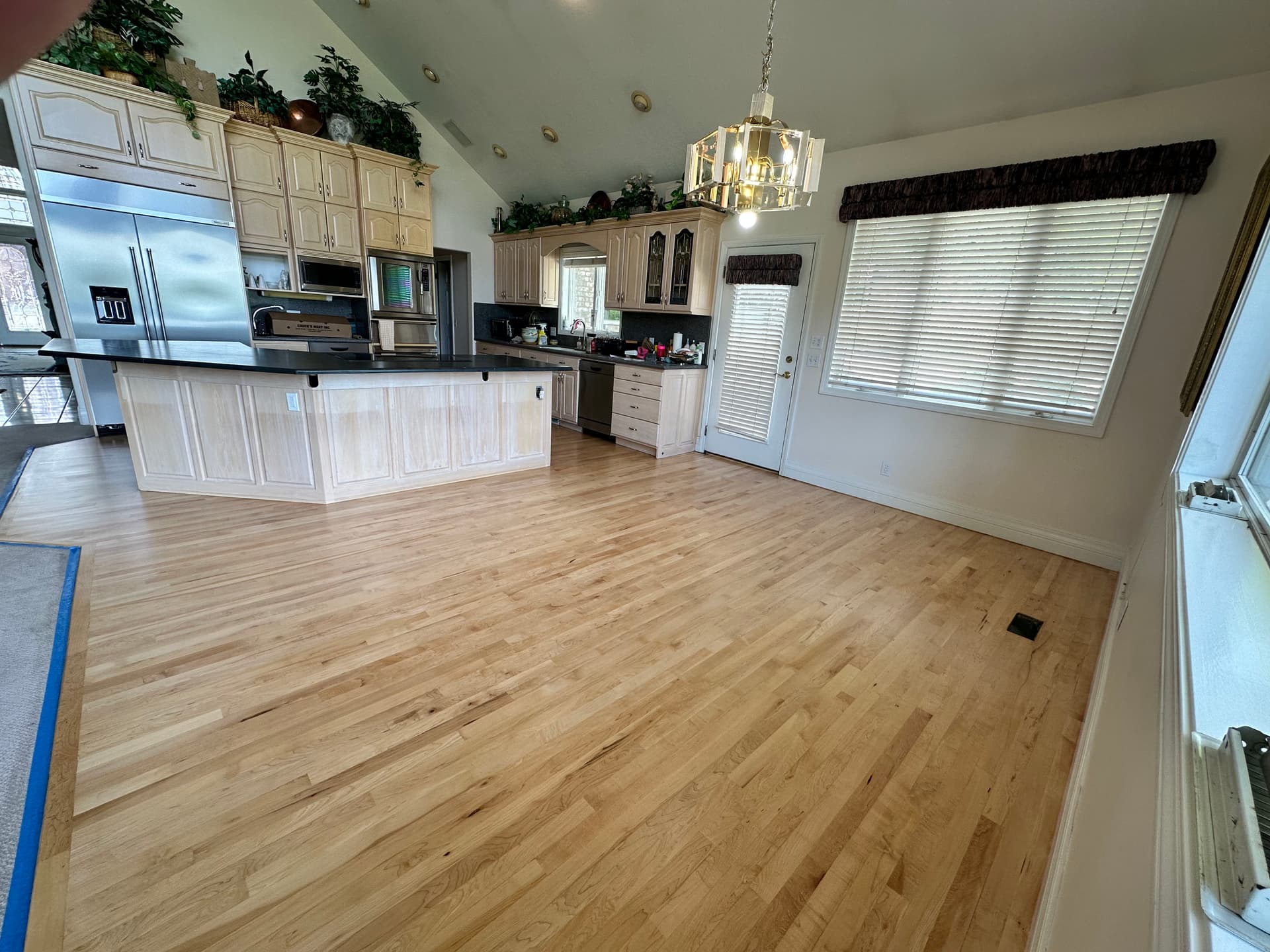 Gallery photos for Maple Hardwood Refinishing with Neutral Stain in Sandy: Image #1