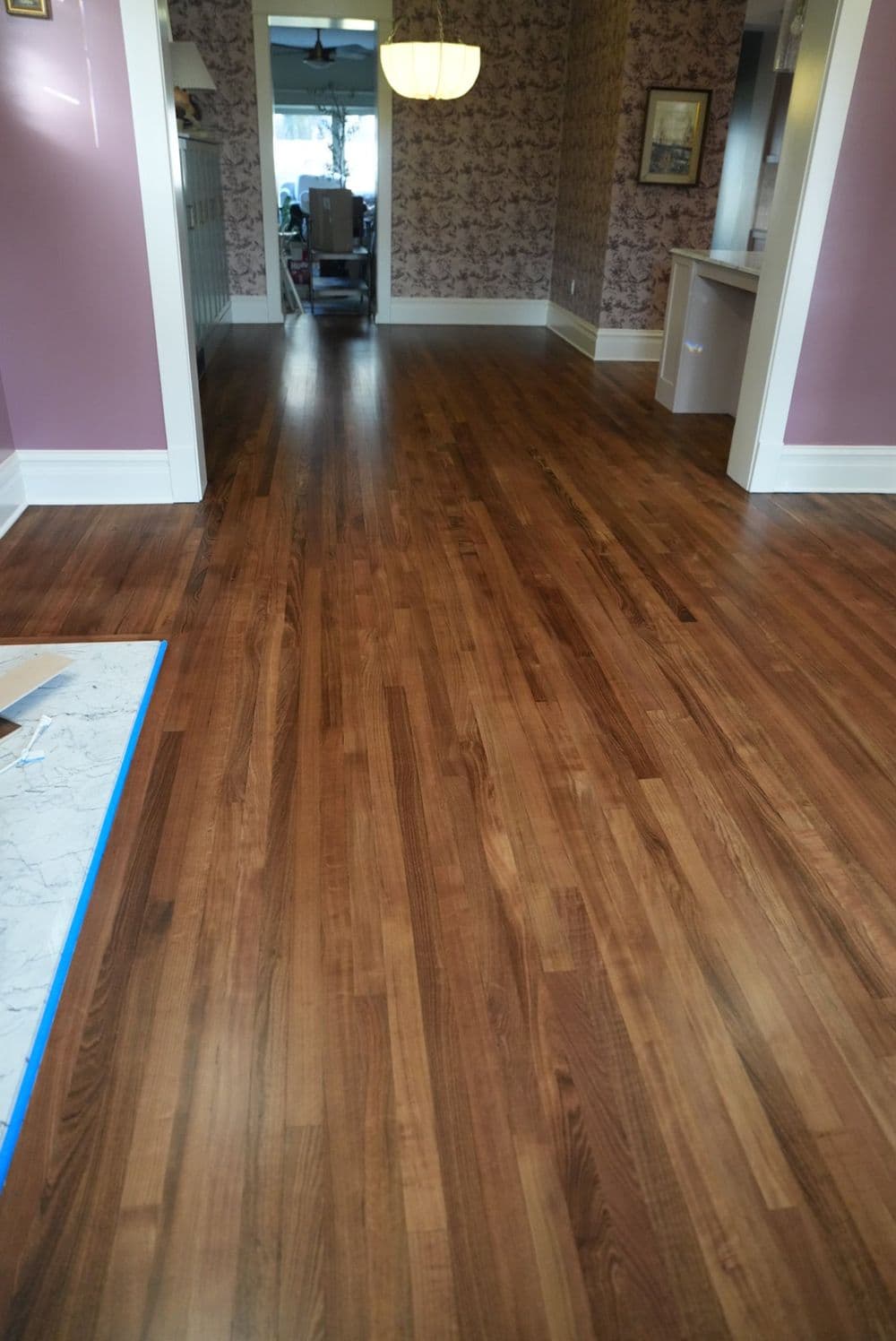 Project Chilean Cherry Hardwood Floors Refinished to a Satin Finish image