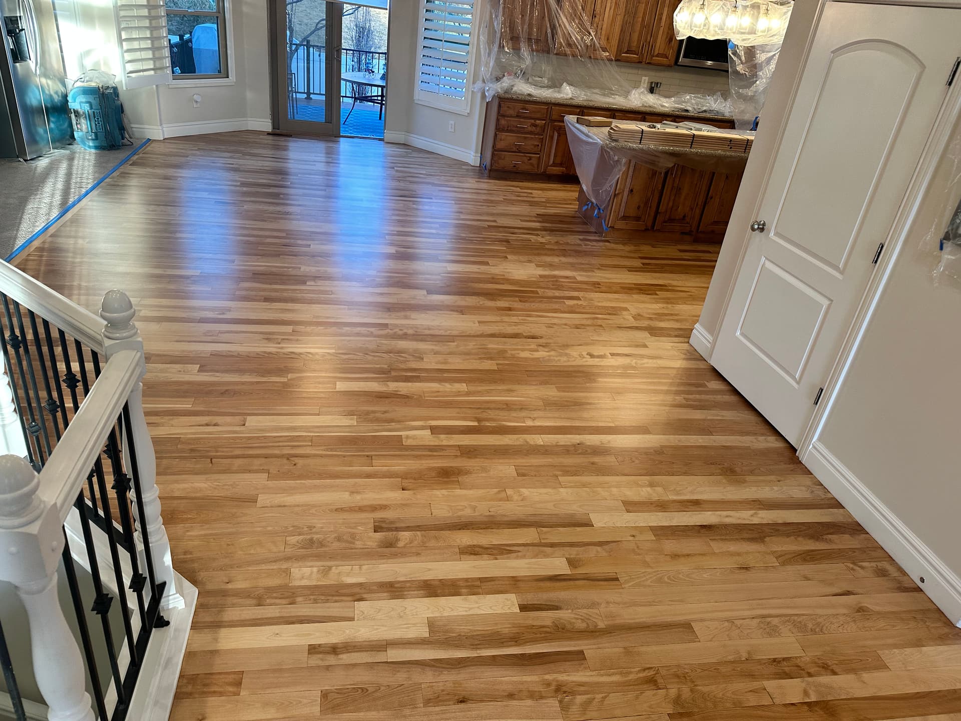 Gallery photos for Birch Hardwood Installation with Warm Neutral Stain in Lehi: Image #1